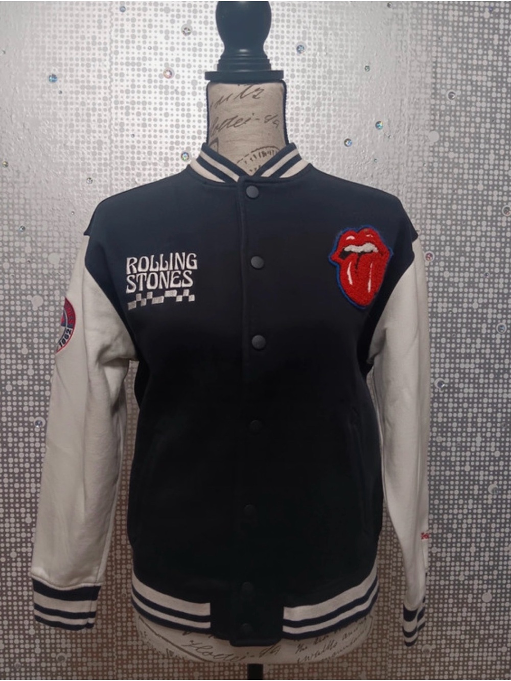 the Rolling Stones Black & White Bomber Varsity Jacket with Tongue Patch